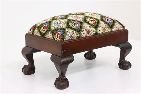 Foot stool with ball and claw feet 